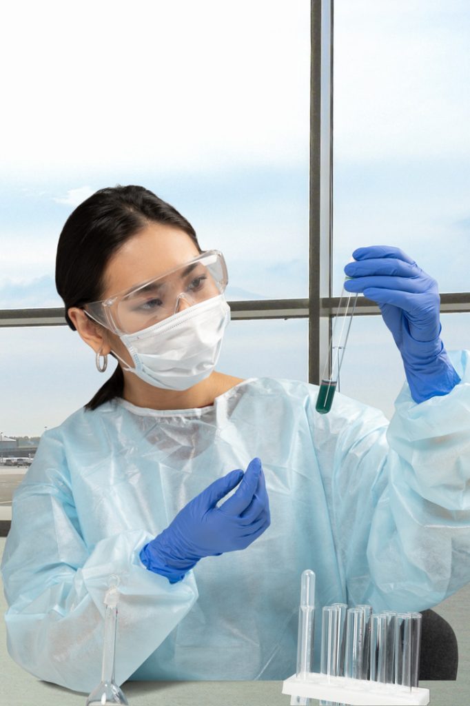 laboratory worker holding a test tube 682x1024 1
